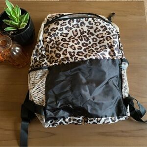 Leopard Print Backpack with Black Accents converts into mini pouch